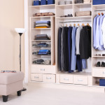 Room interior with wardrobe and stylish ottoman chair